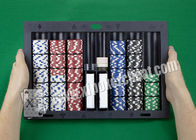 Μαύρος πλαστικός δίσκος επιτραπέζιων τσιπ πόκερ ανιχνευτών πόκερ με το χέρι - κρατημένη κάμερα